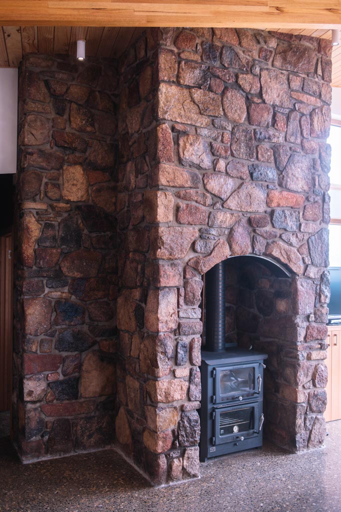 Tuft house stone fireplace