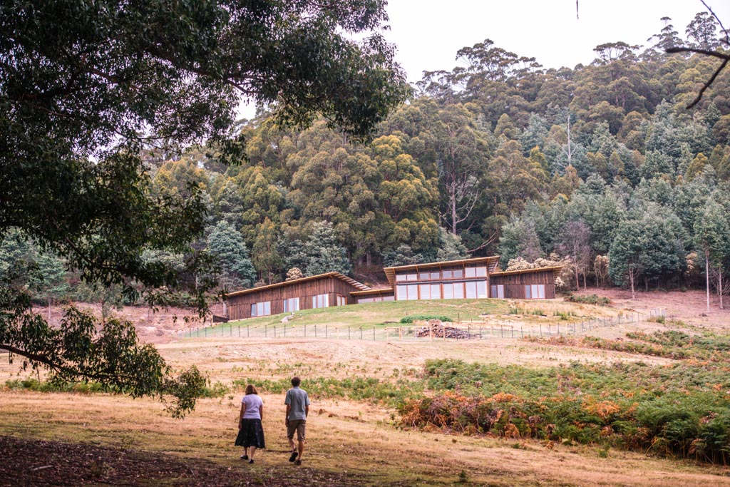 Photo of the tuft house from down the hill