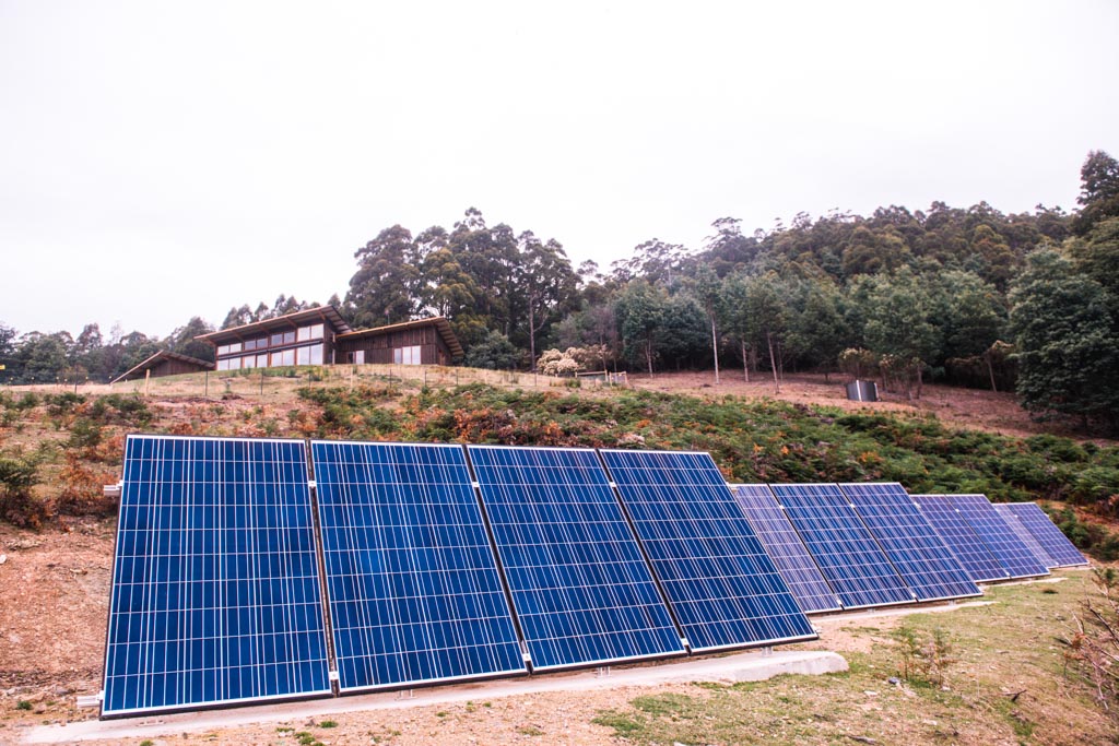 Photo of the Tuft house solar panel arrays.